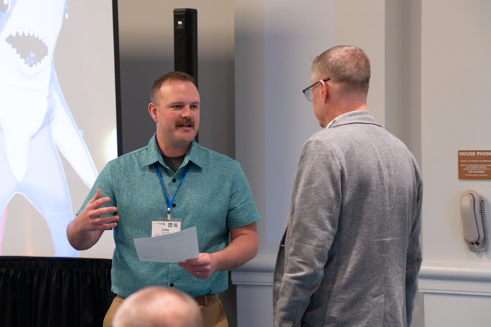 An attendee pitching in the IC Shark Tank