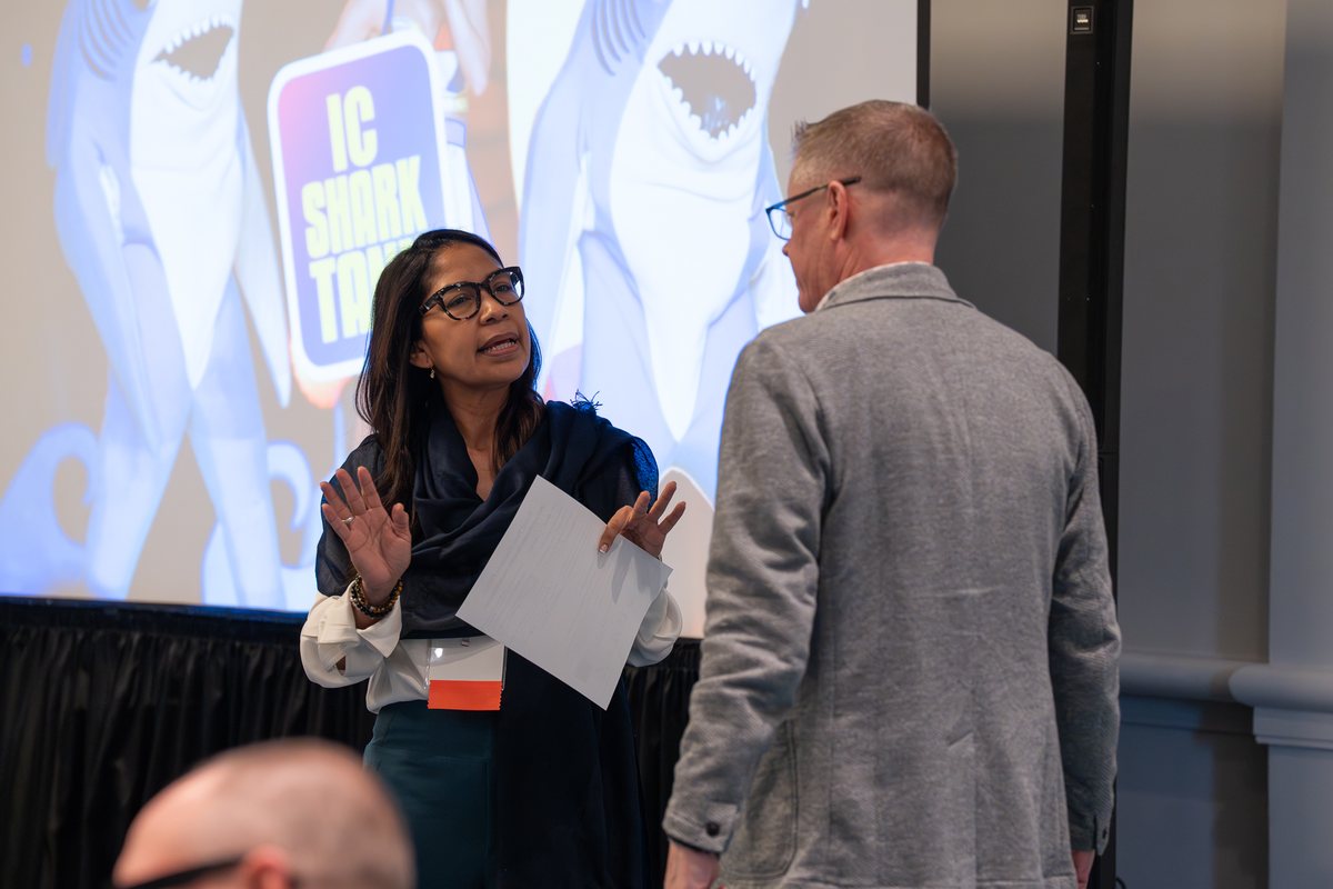 An attendee pitching in the IC Shark Tank