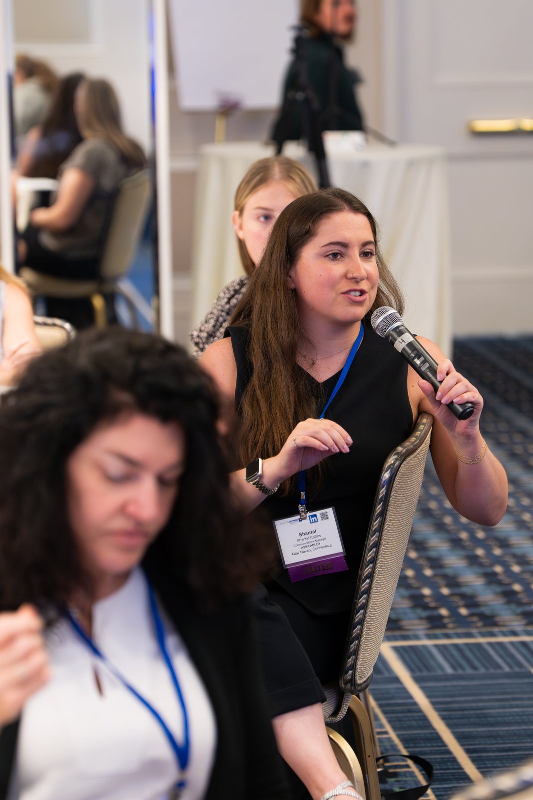 An attendee asking a question