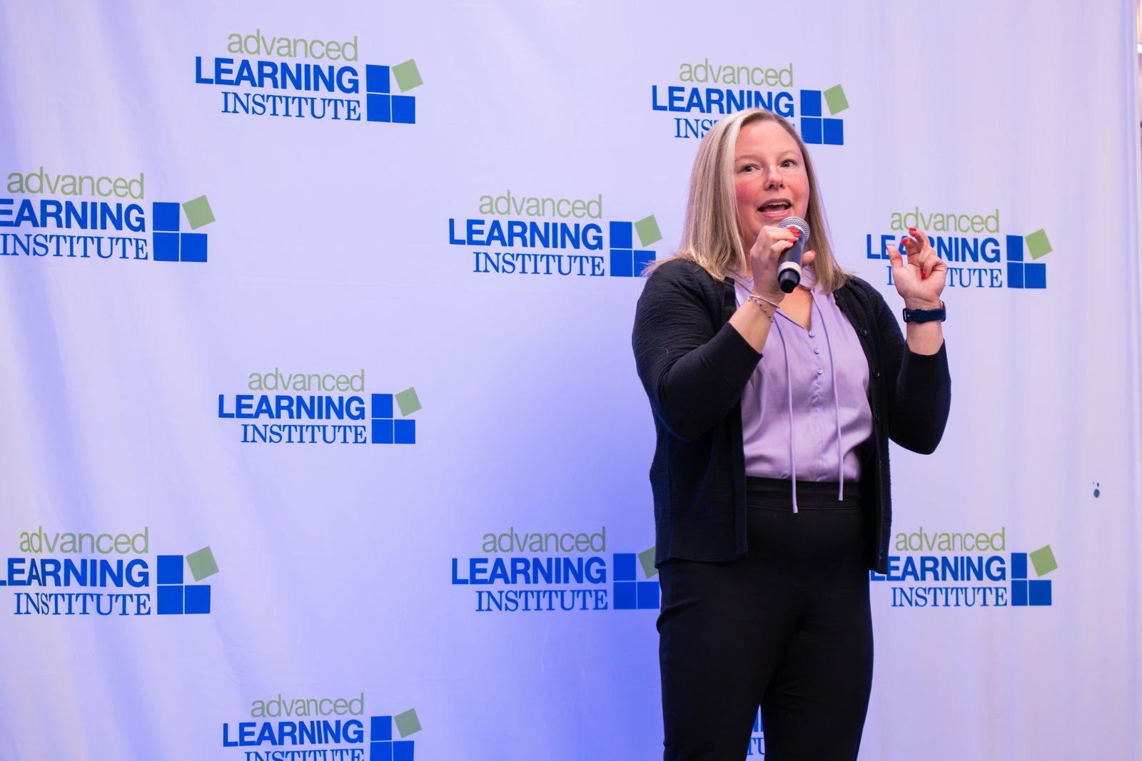 A speaker on stage