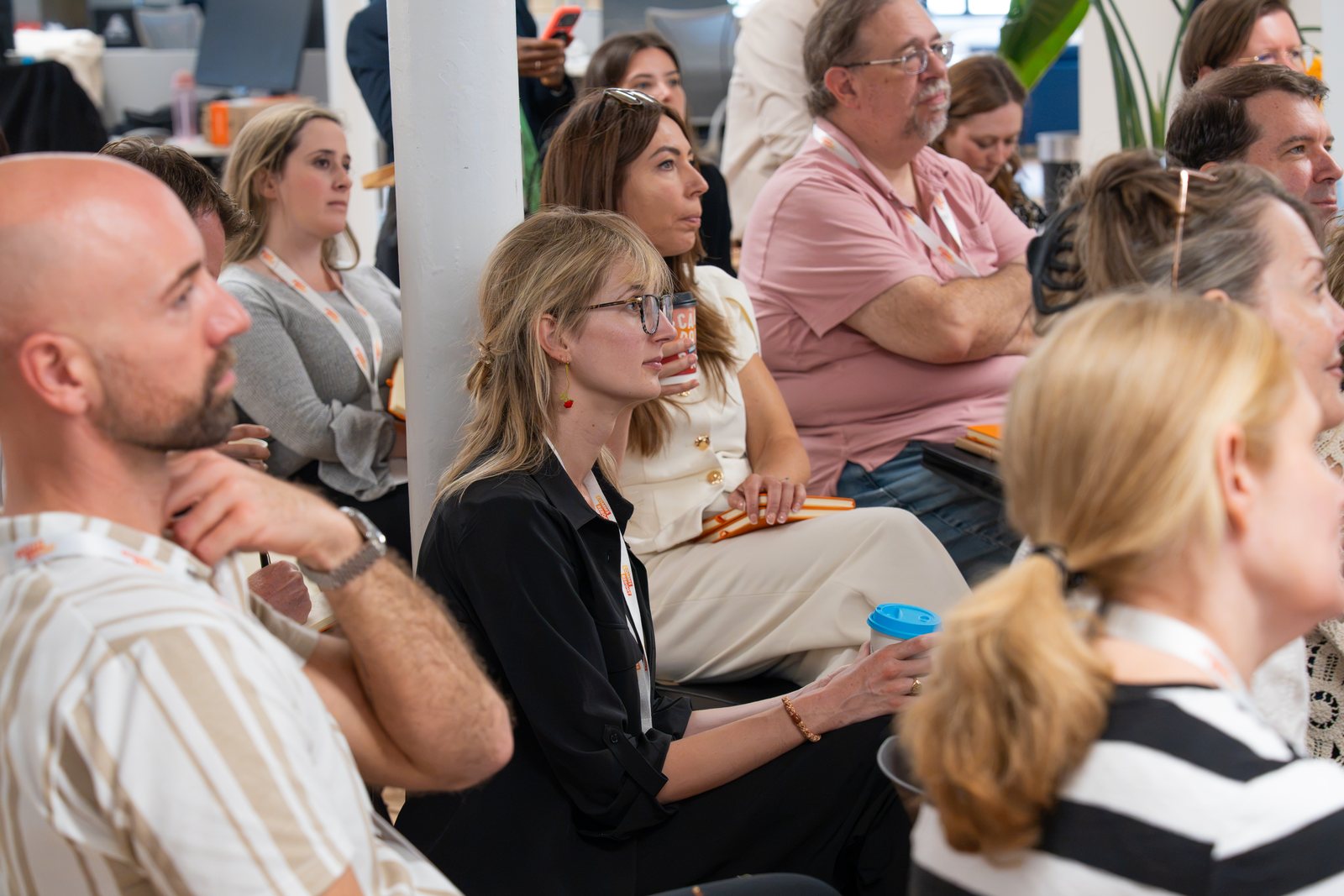 Attendees in a group discussion