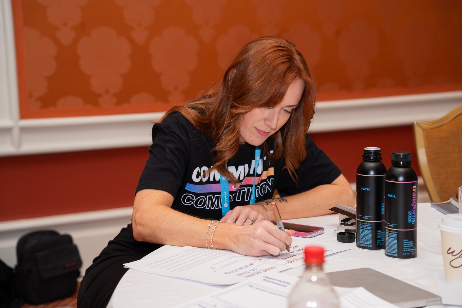 An attendee working through an exercise