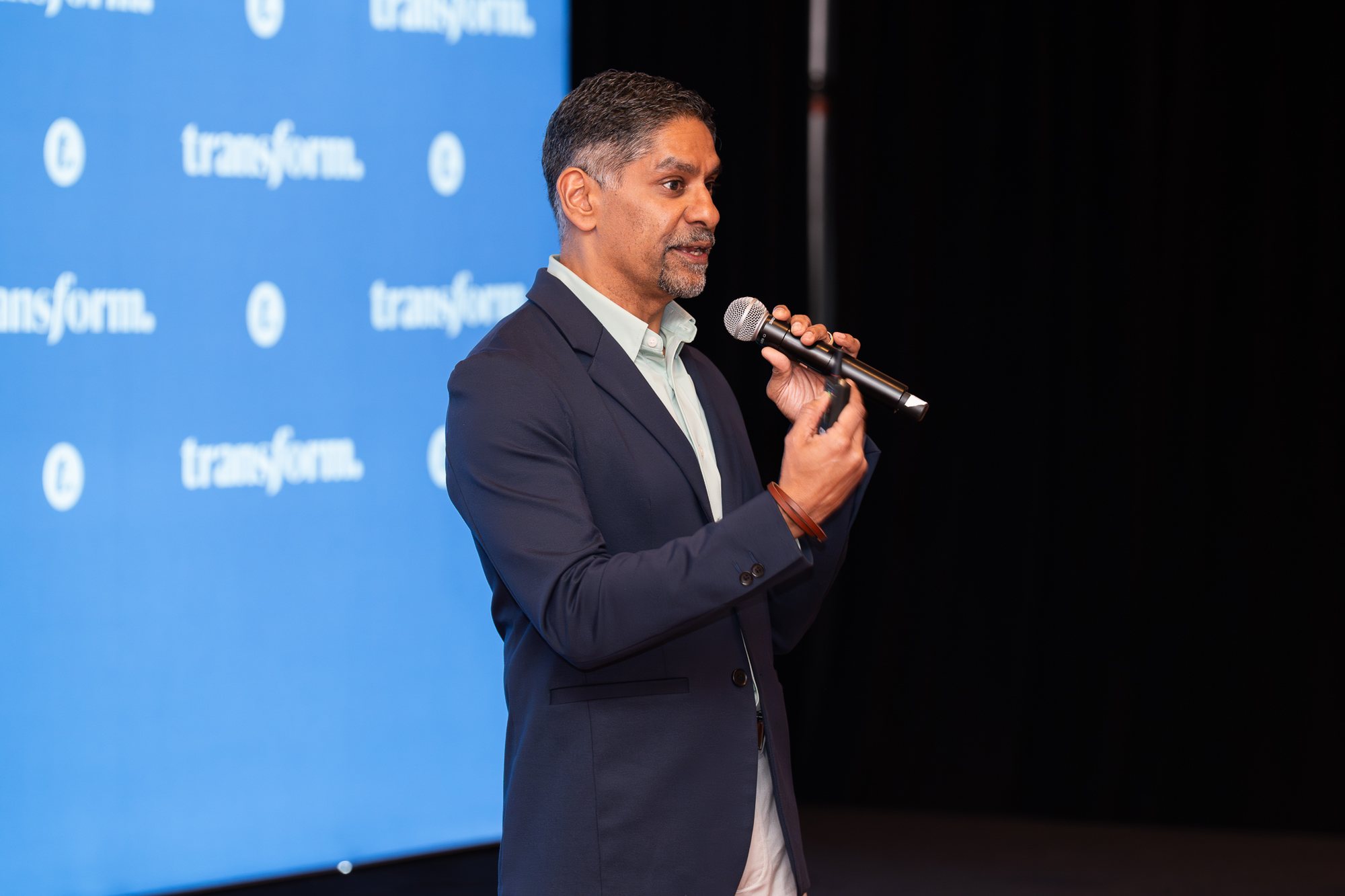 Pinaki Kathiari speaking on the Transform stage at the EX Factor Summit