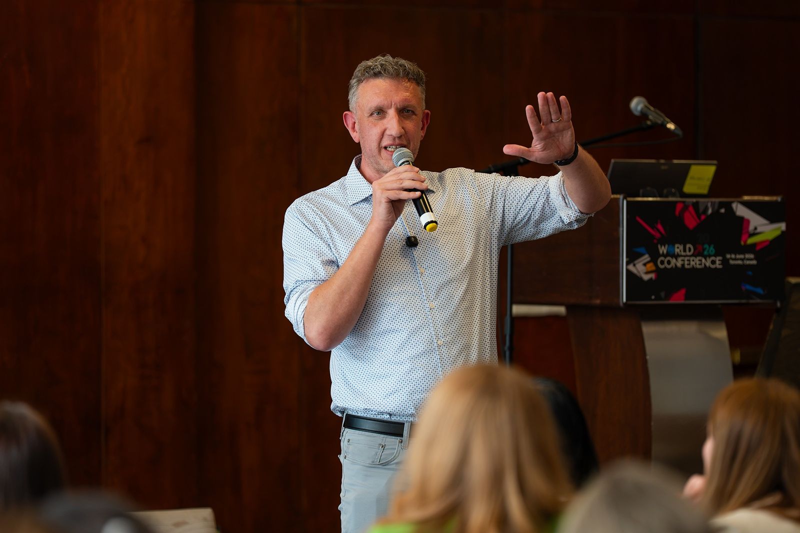 Chuck Gose gesturing to the audience