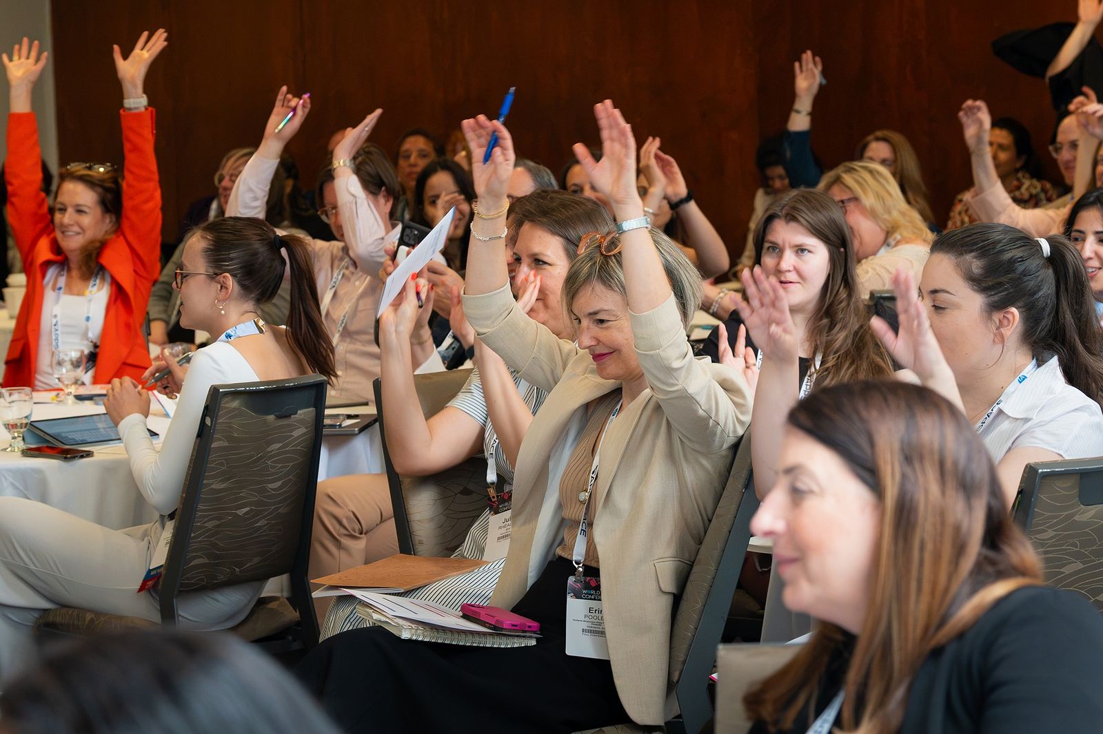 The audience doing a stadium wave during the session