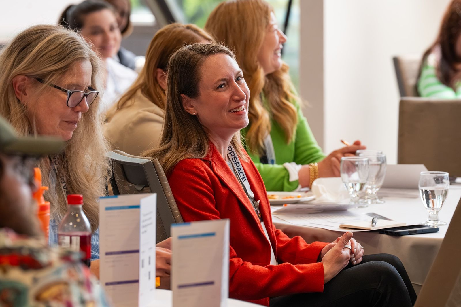 Attendees smiling during the session