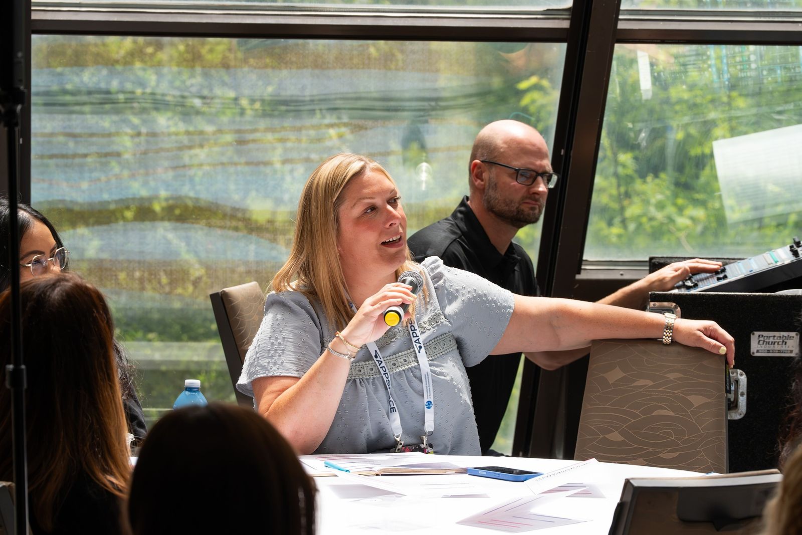 An attendee sharing with the room