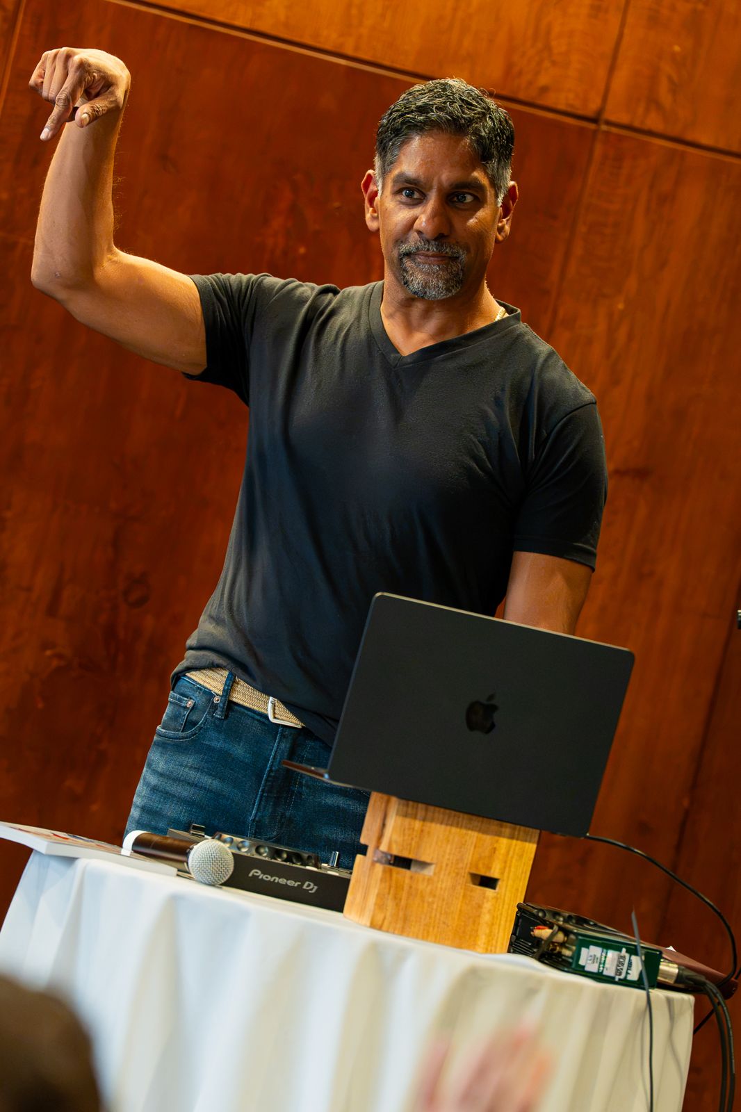 Pinaki Kathiari with his hand raised mid-set