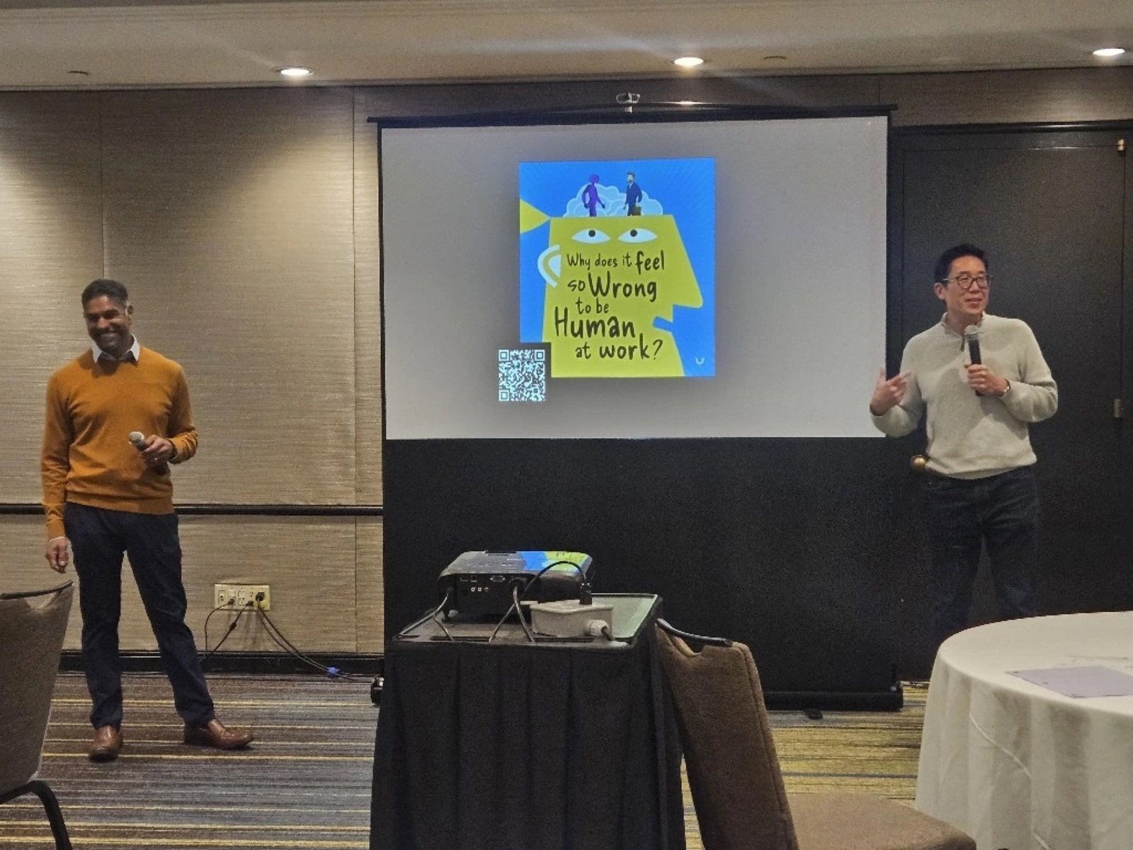 Pinaki Kathiari and Chris Lee on stage at ALI Toronto