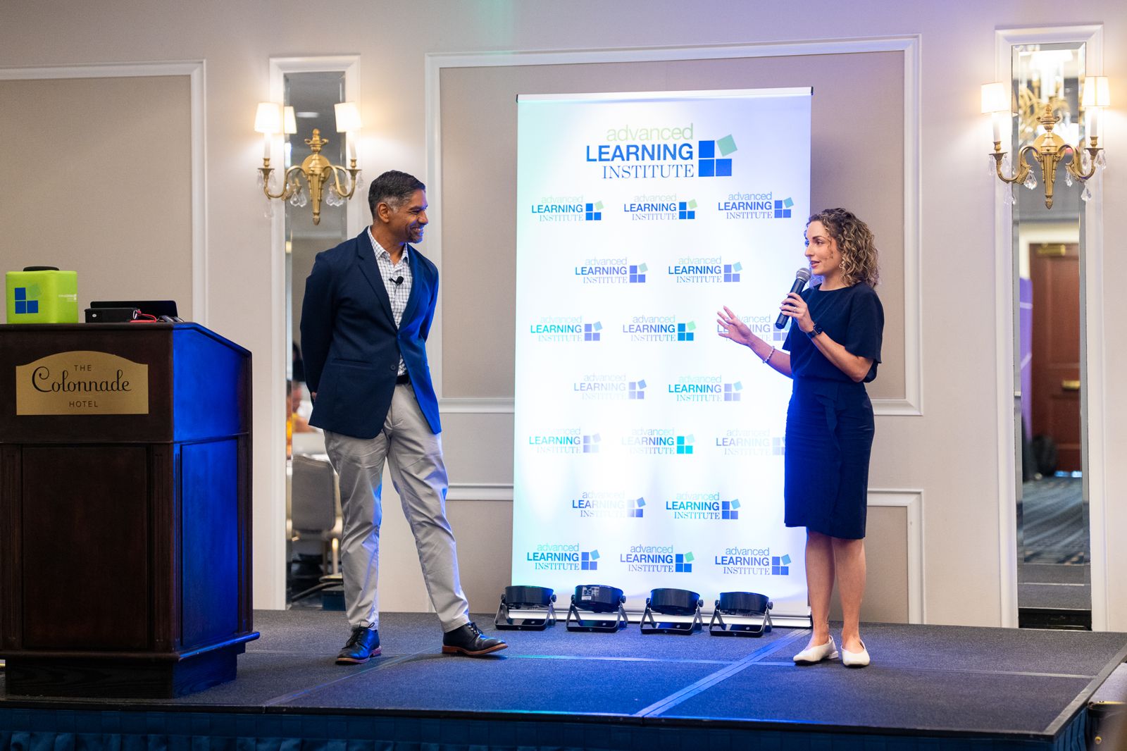 Pinaki Kathiari and Teresa Palase presenting