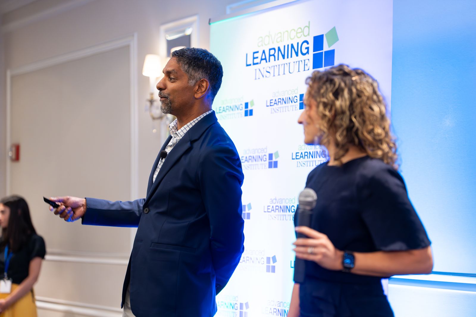 Pinaki Kathiari presenting beside Teresa Palase