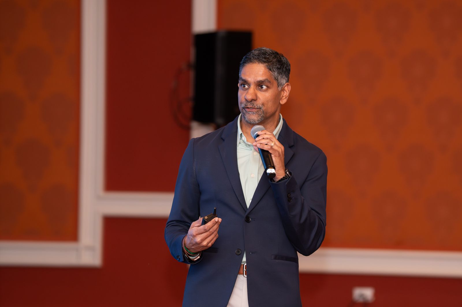 Pinaki Kathiari speaking to the room